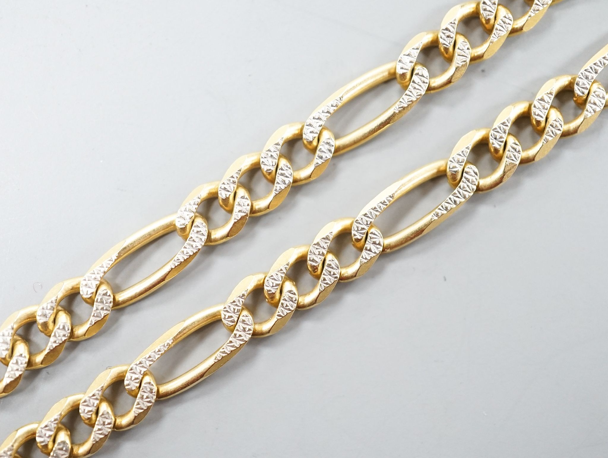 A modern 750 two colour yellow metal curb link chain, 46cm, 22. 8 grams.